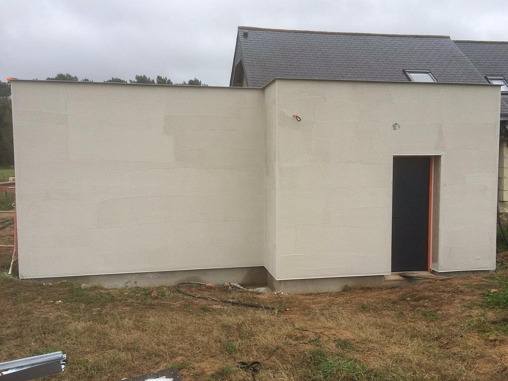 Projection de la résine sur la laine de roche