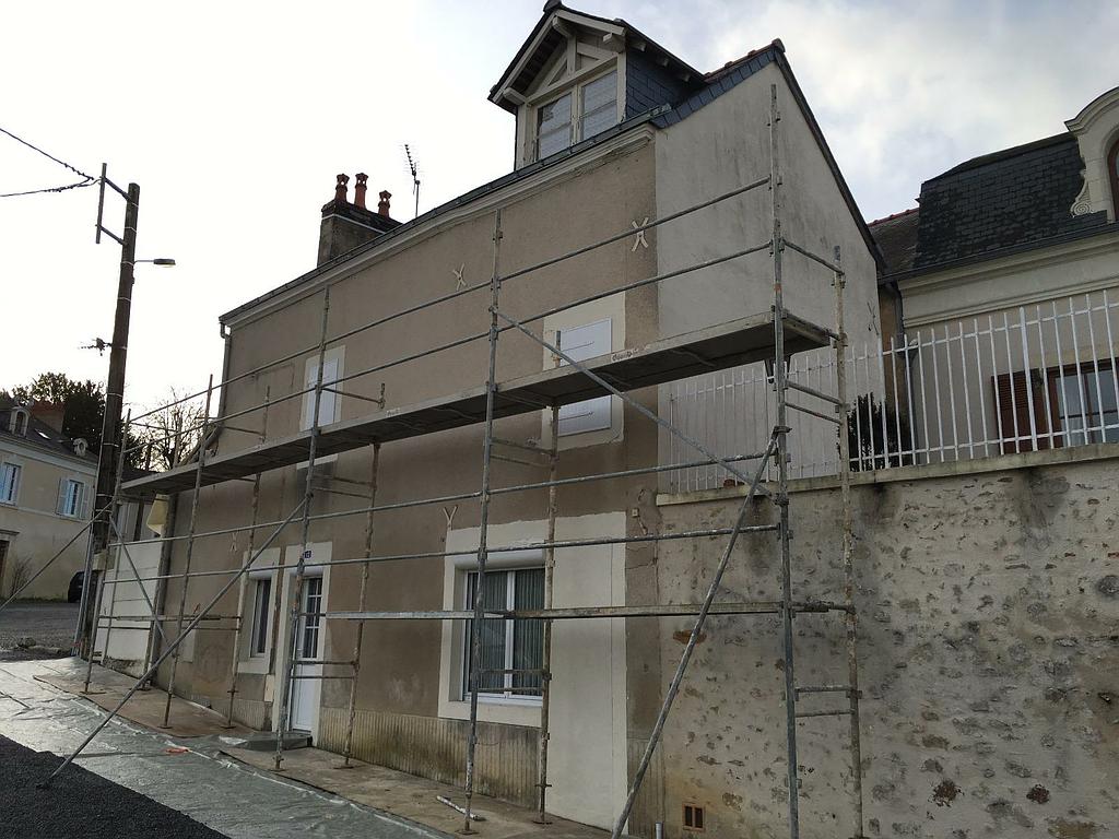 Rénovation façade application d'un enduit à base de chaux