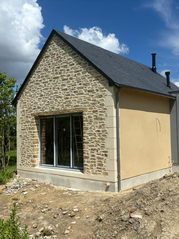Maison avec travaux d'isolation extérieure