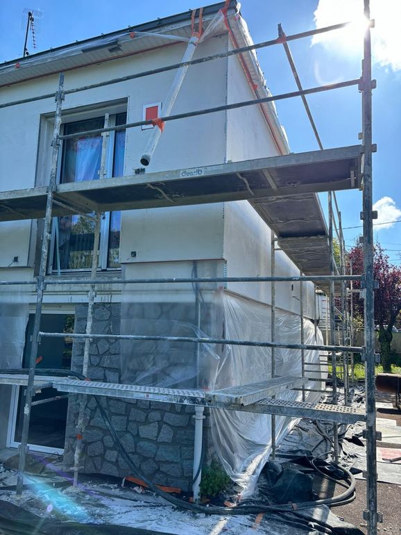 Maison avec travaux d'isolation extérieure