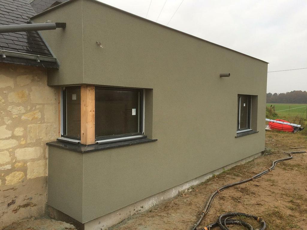 Enduit gratté hydraulique sur isolation