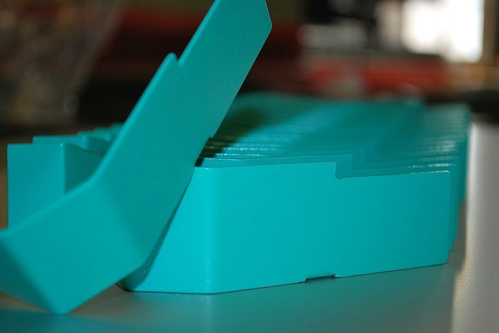 T.I.B. SA à Court - spécialistes de la tôlerie - Pièces thermolaquées