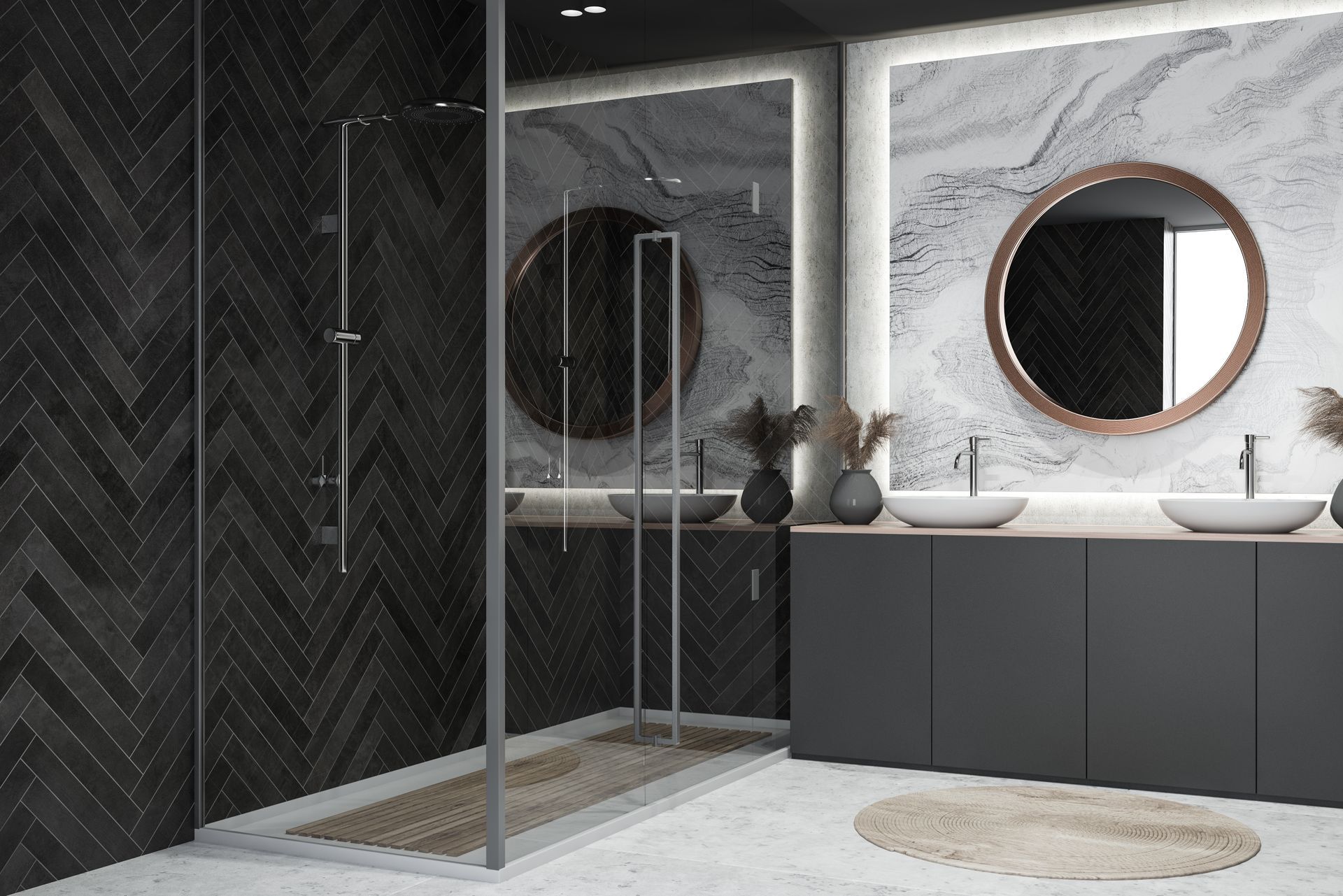 Salle de bains moderne avec carrelage gris à chevrons, douche, double vasque et miroir rond.