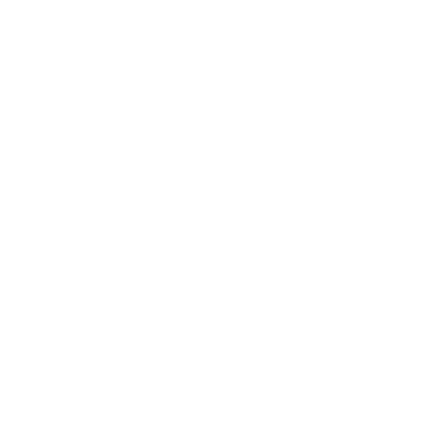 Una persona con mascarilla quirúrgica y bata quirúrgica realiza un procedimiento quirúrgico preciso a un paciente en un quirófano.