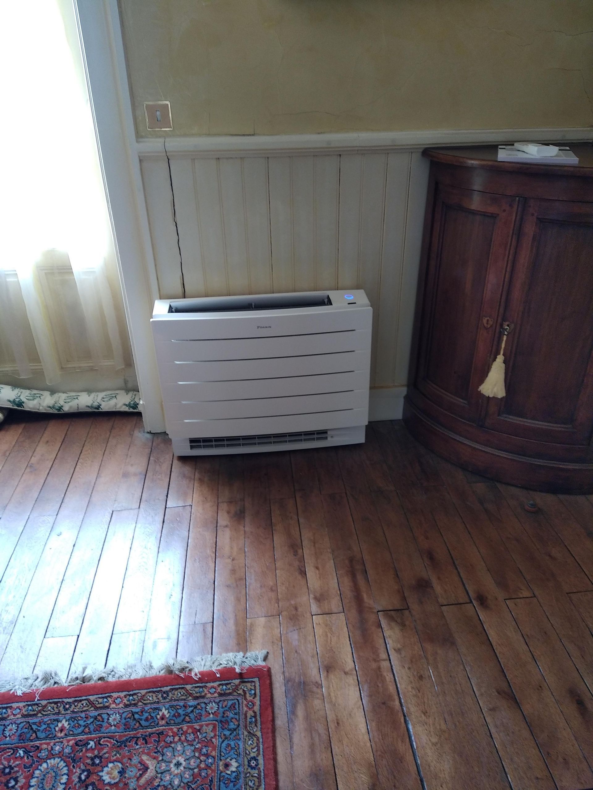 Radiateur console dans un salon