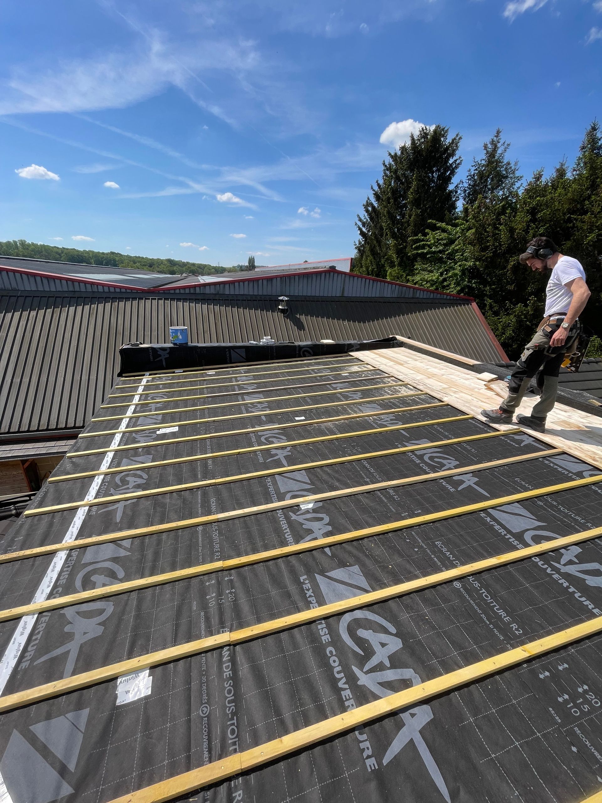 Isolation par l'extérieur d'un toit