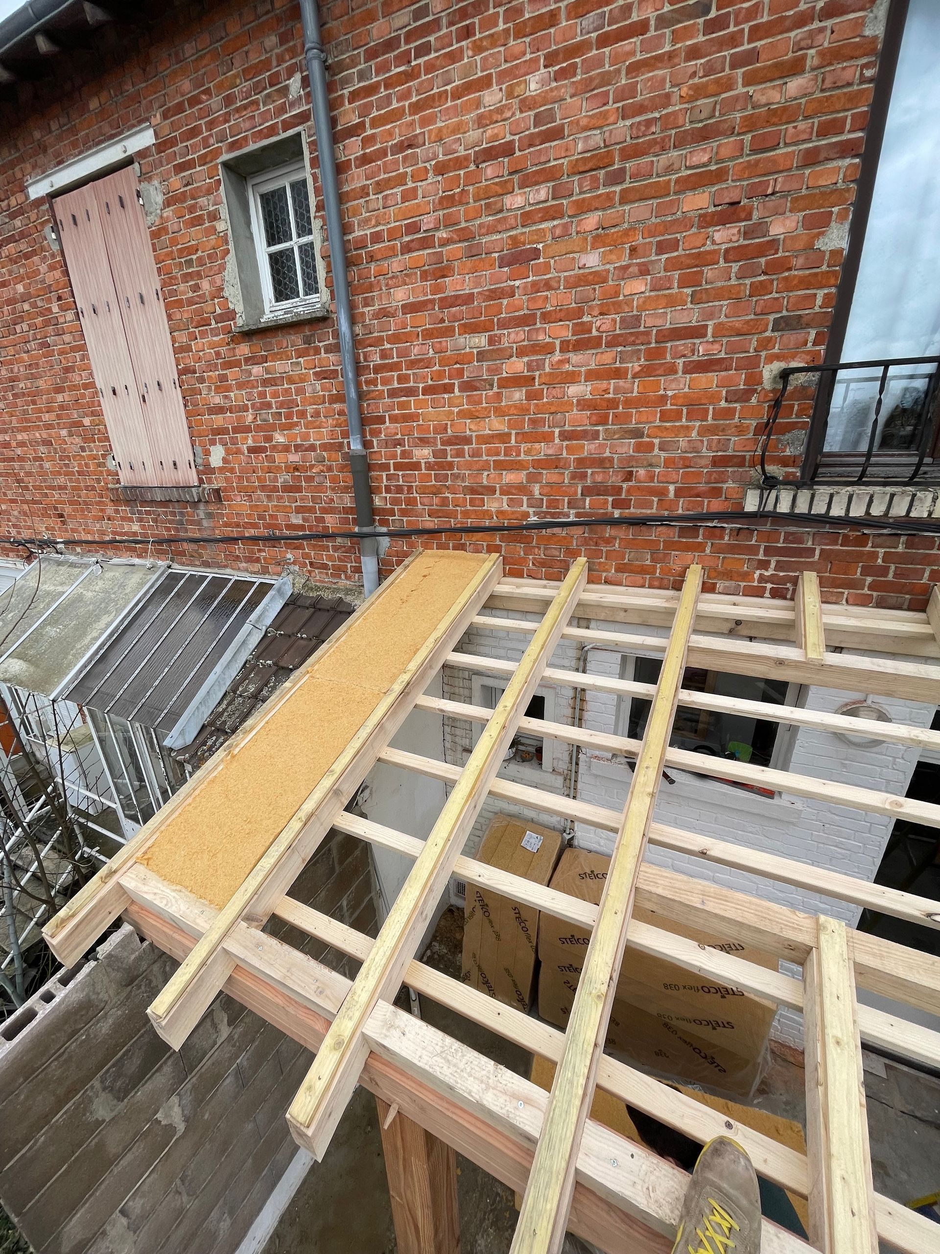 Pose de fibres de bois