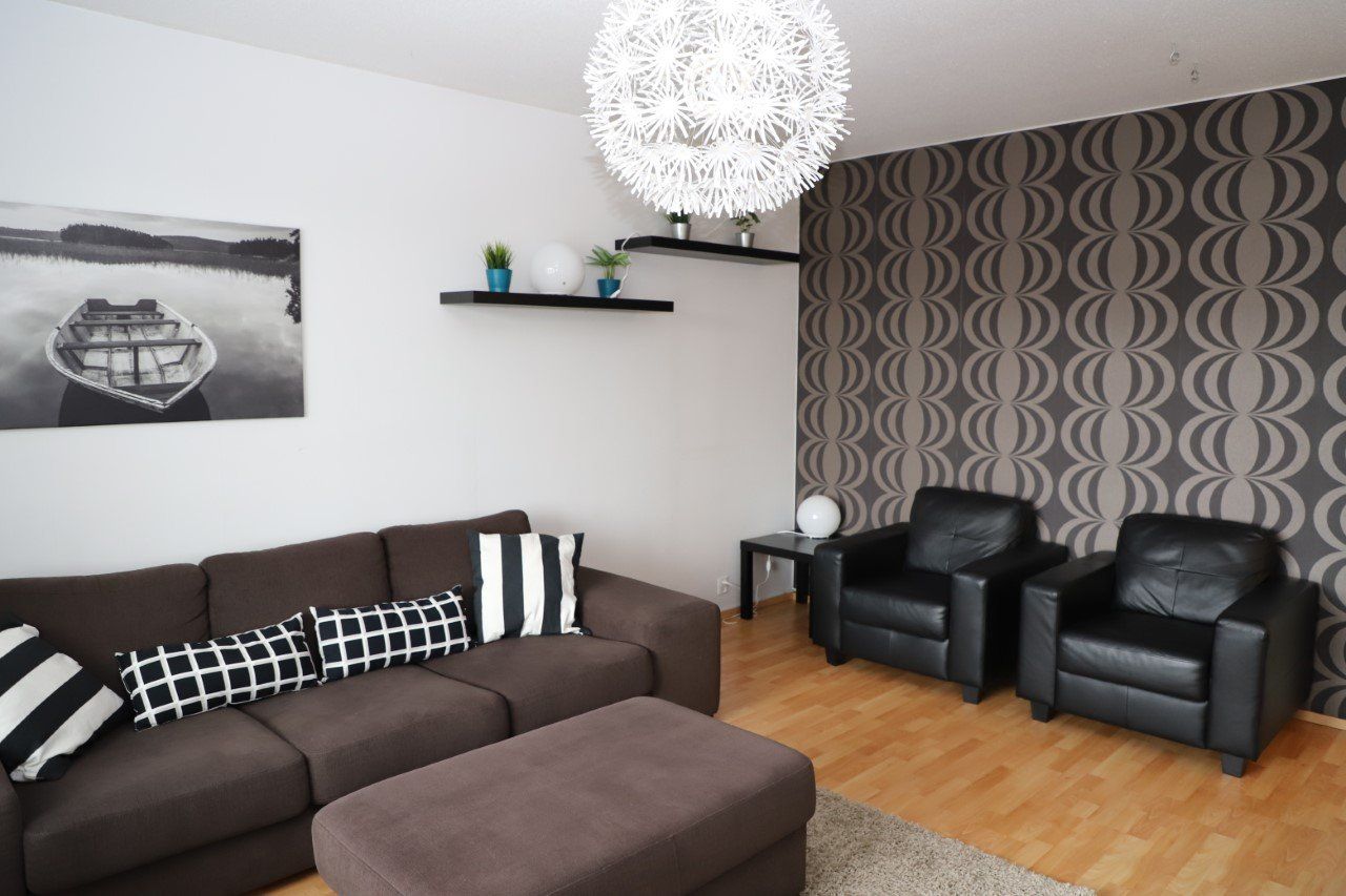 Huoneisto 2 olohuone - Kalustettumajoitus.fi