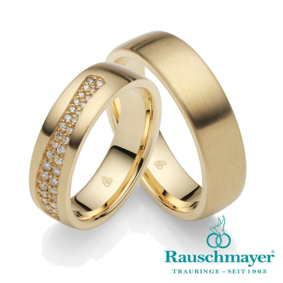 Trauringpaar aus Gold mit Stein von Rauschmayer