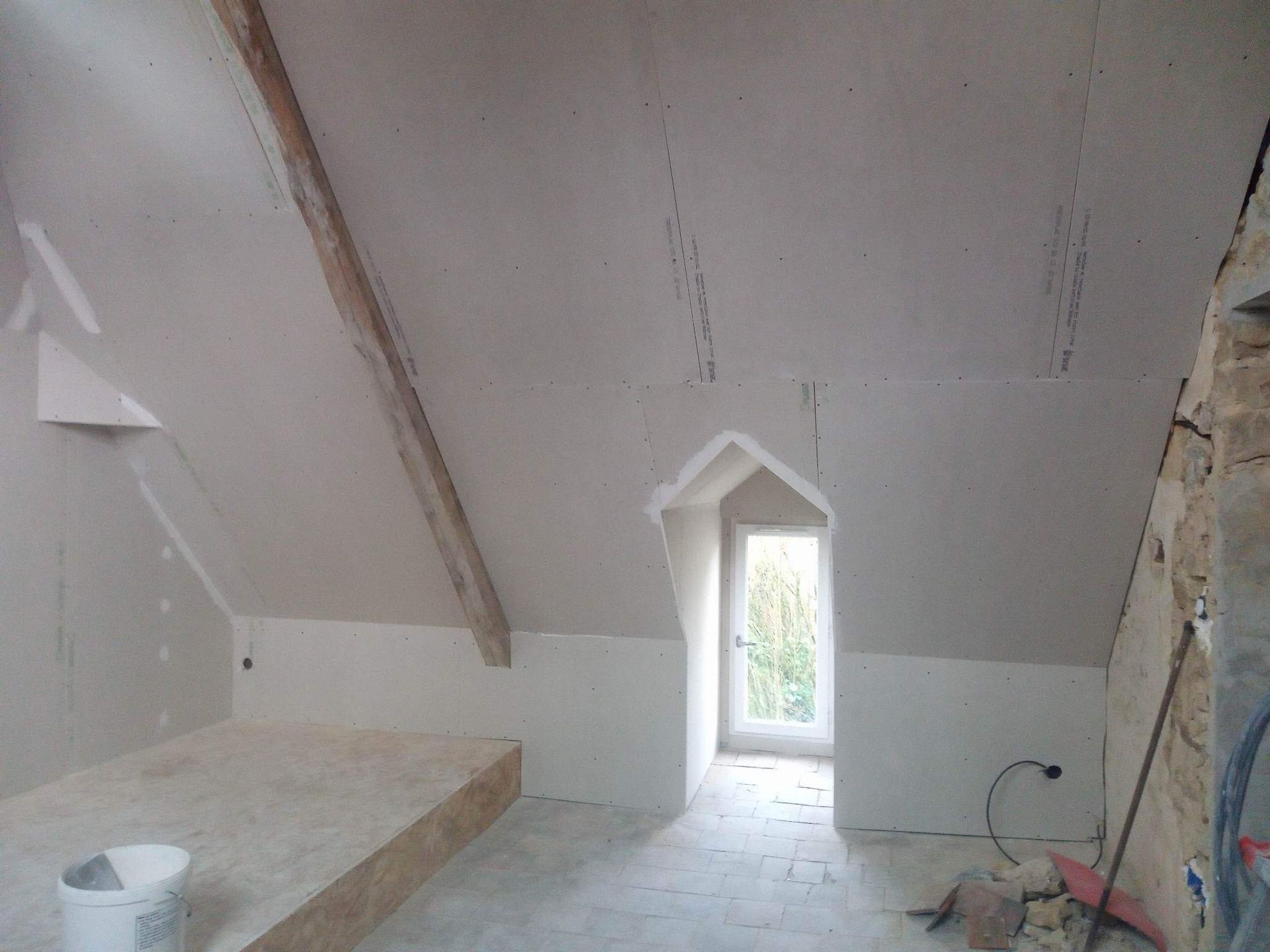 Porte d'entrée vitrée vue de l'intérieur