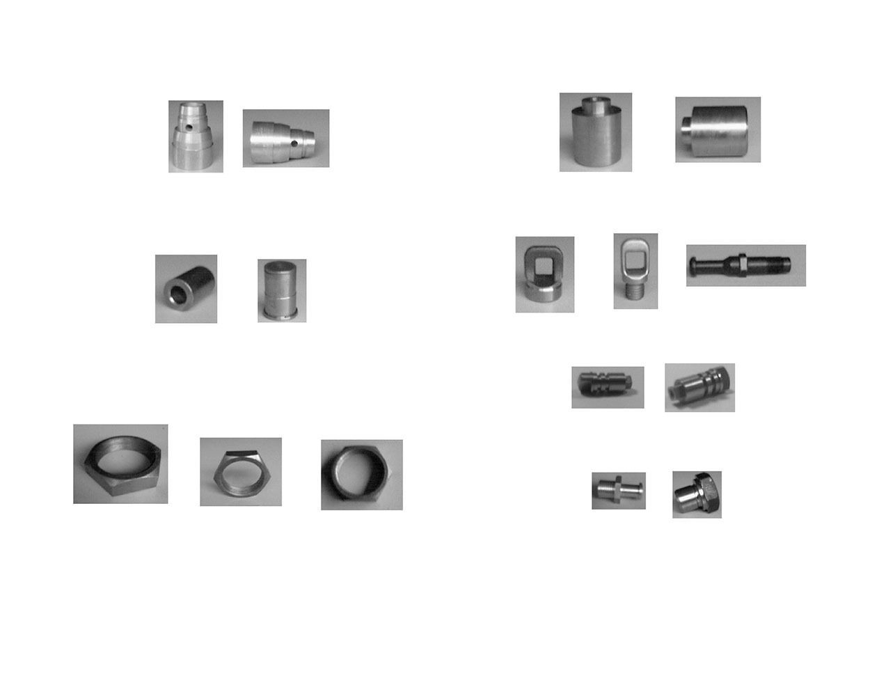 Un montón de diferentes tipos de objetos de metal sobre un fondo blanco.