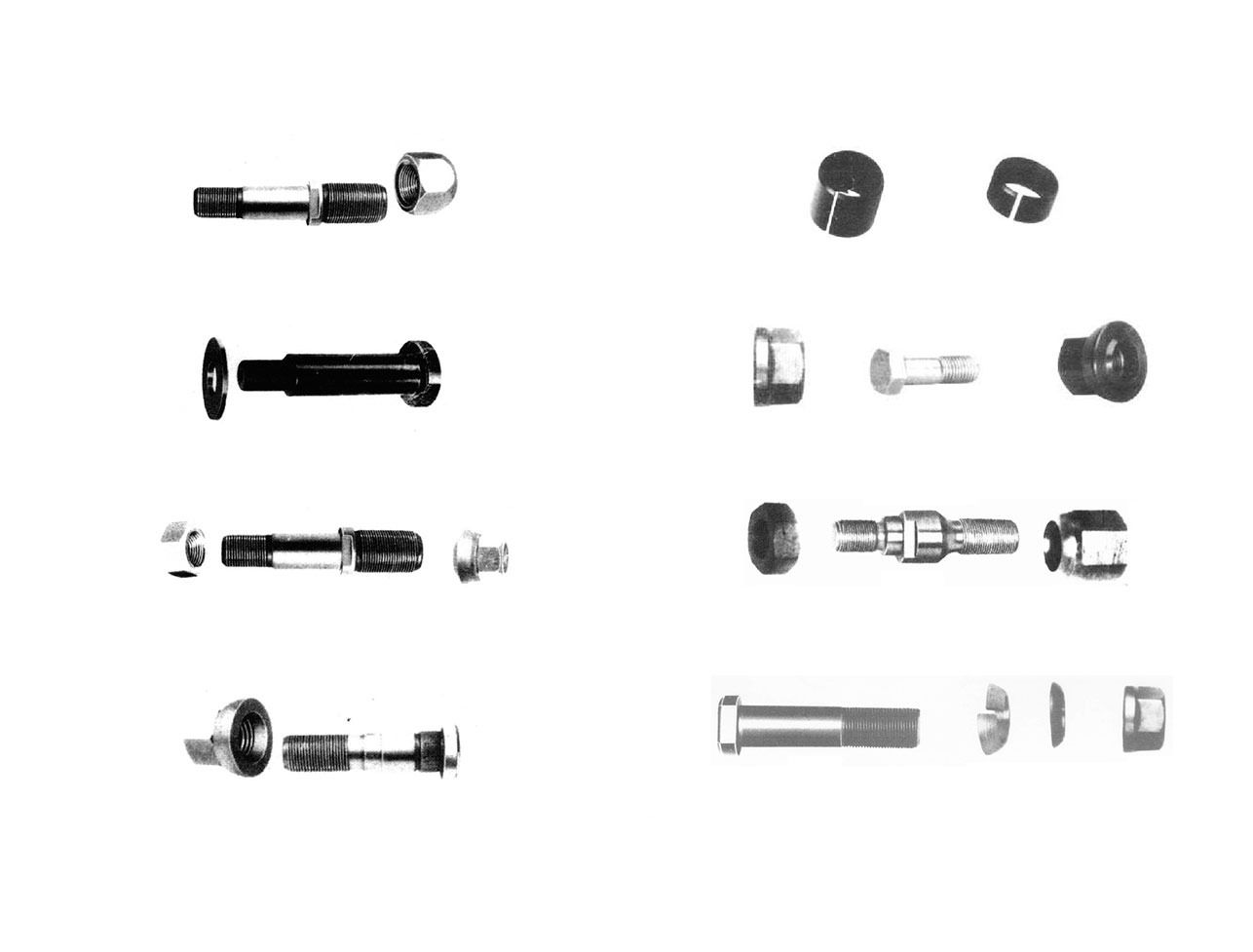 Un montón de diferentes tipos de tornillos y pernos sobre un fondo blanco.