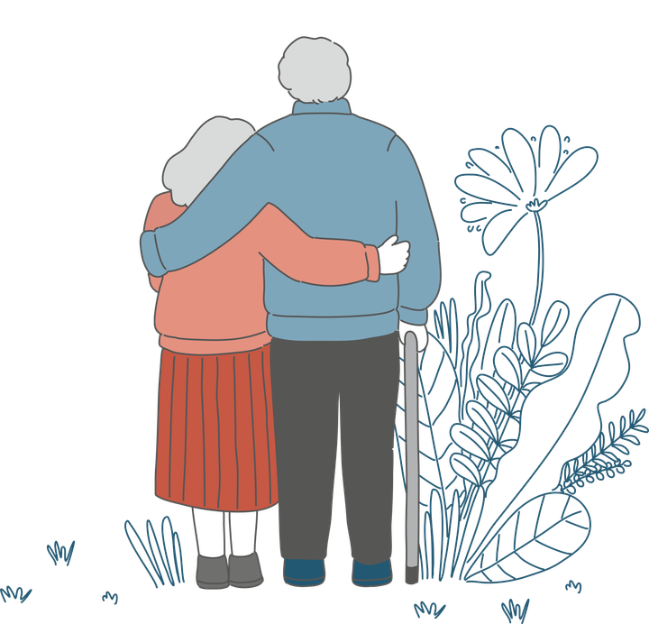 Ein älteres Ehepaar umarmt sich und betrachtet Blumen. Einer der beiden hält einen Gehstock.