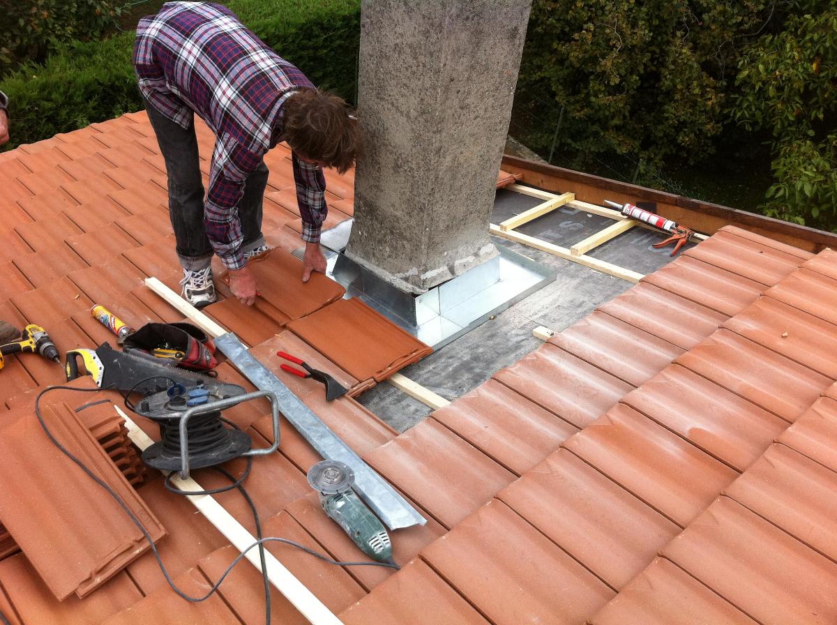 Travaux tuiles toit