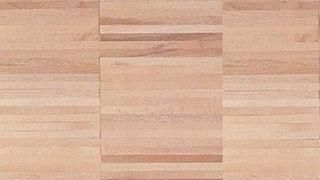 Eine Nahaufnahme eines Holzbodens mit Streifenmuster