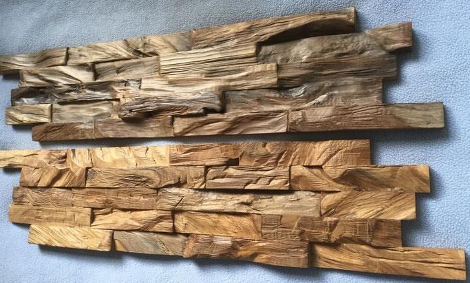Zwei Holzstücke liegen übereinander auf einem Tisch.