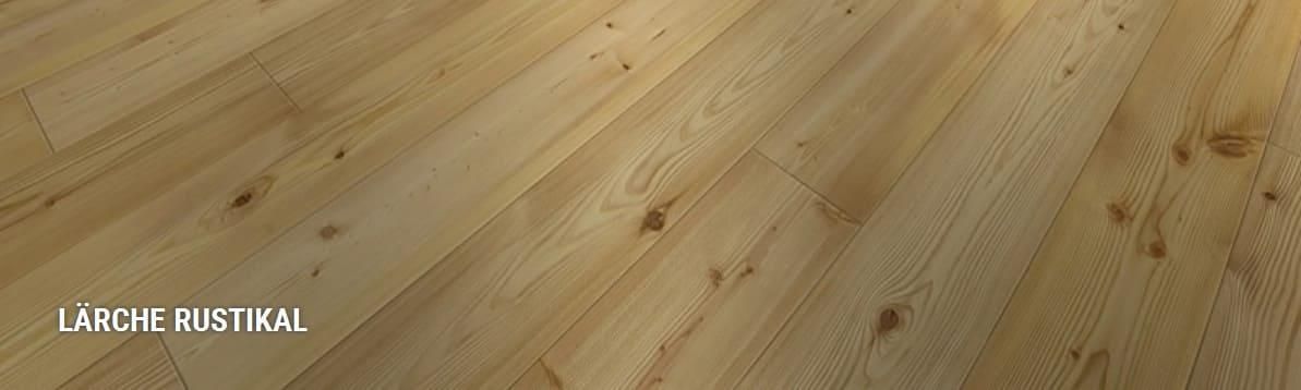 Eine Nahaufnahme eines Holzbodens in einem Raum.