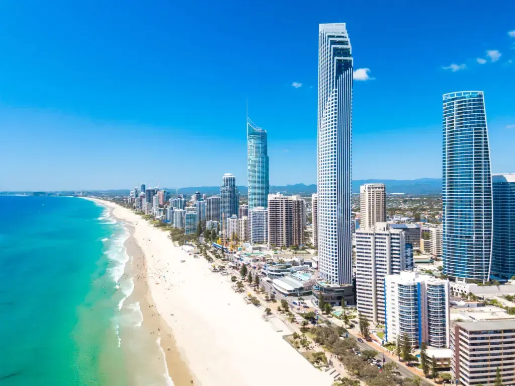 An aerial view of Gold Coast Surfers Paradise with a beach and a city skyline. Beautiful place to stay