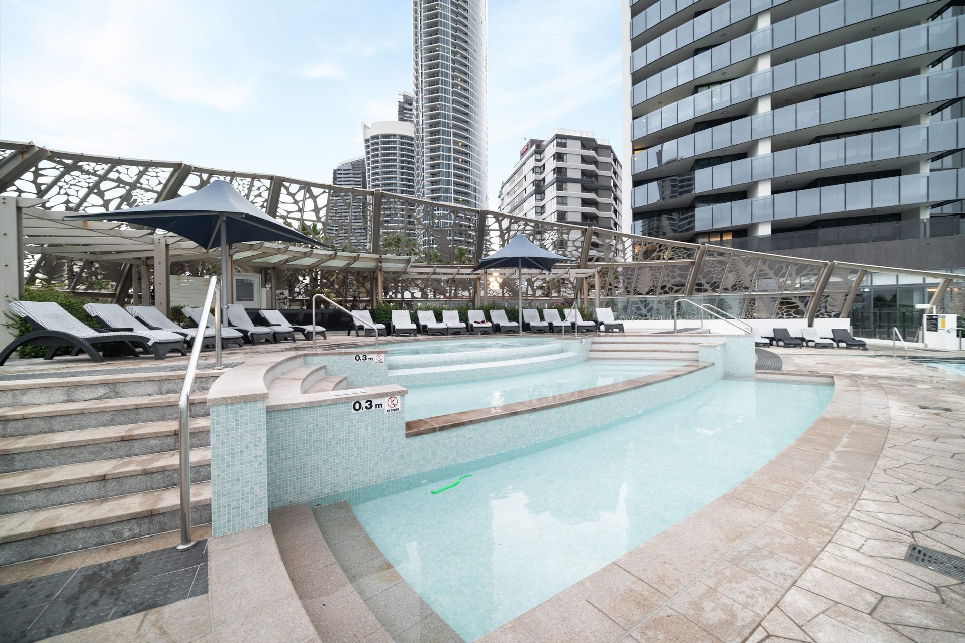 Outdoor pool area and Soul Resort for Wow Stay appartment