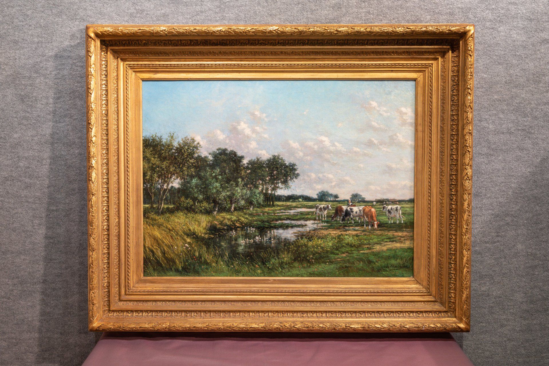 Une peinture à l'huile représentant du bétail paissant dans un pâturage 