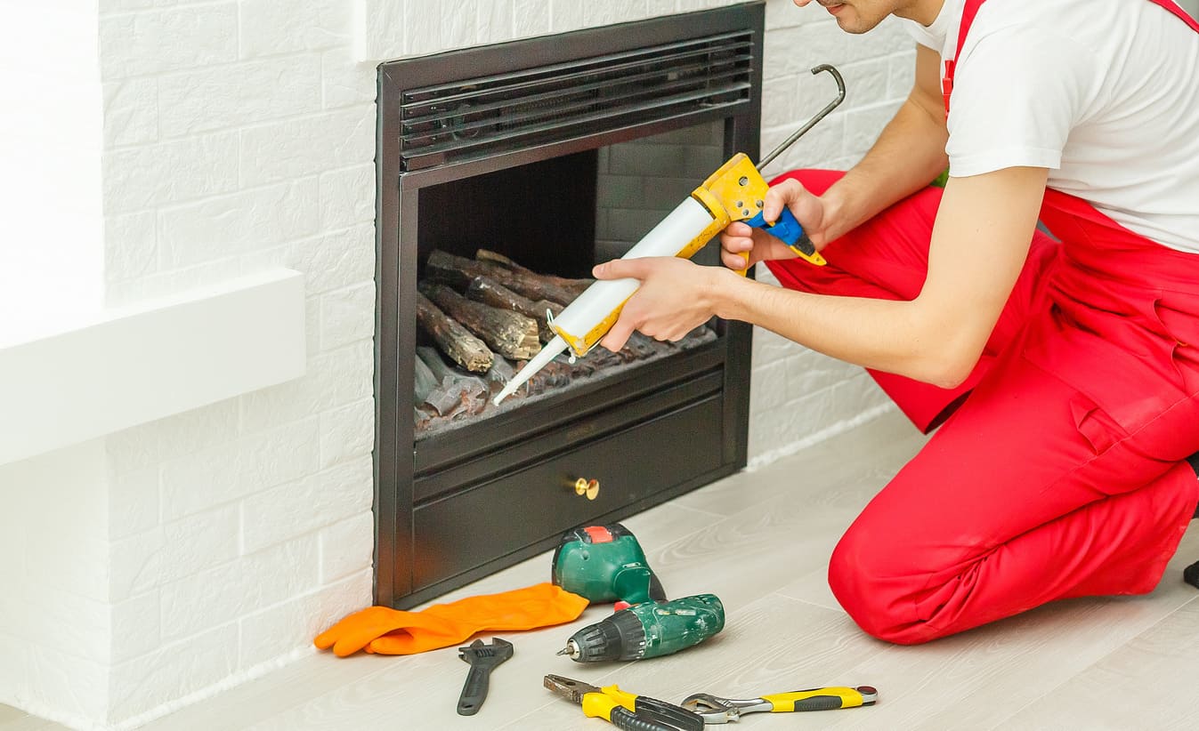 Réparation d'une vitre de cheminée