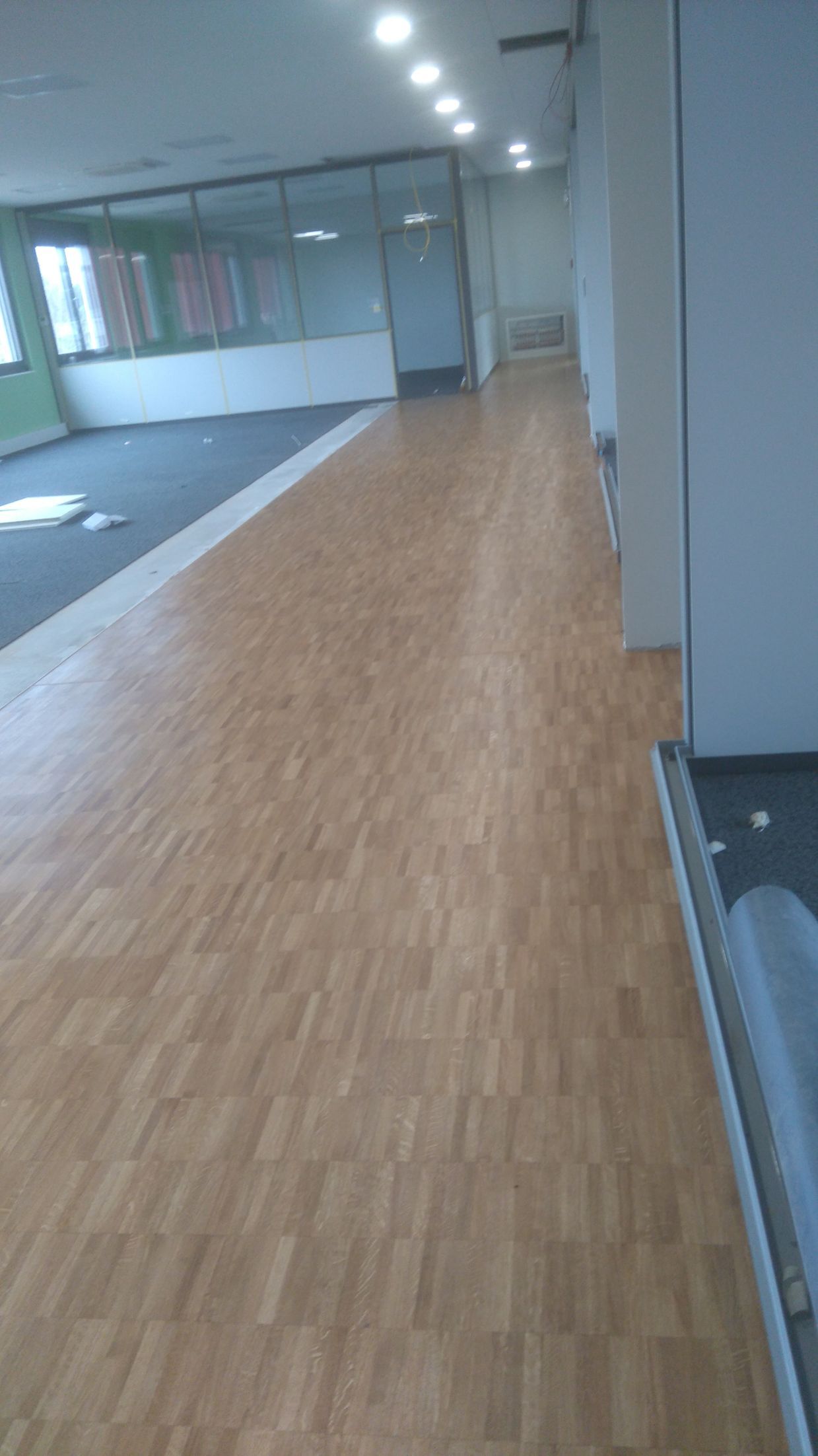 Neuverlegung und Versiegelung eines Parkettbodens