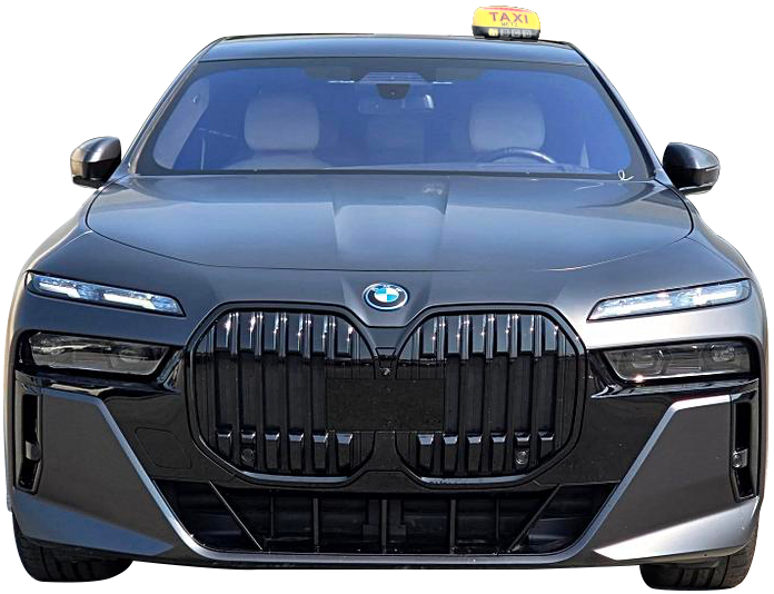Berline BMW grise avec panneau « taxi » sur le toit.