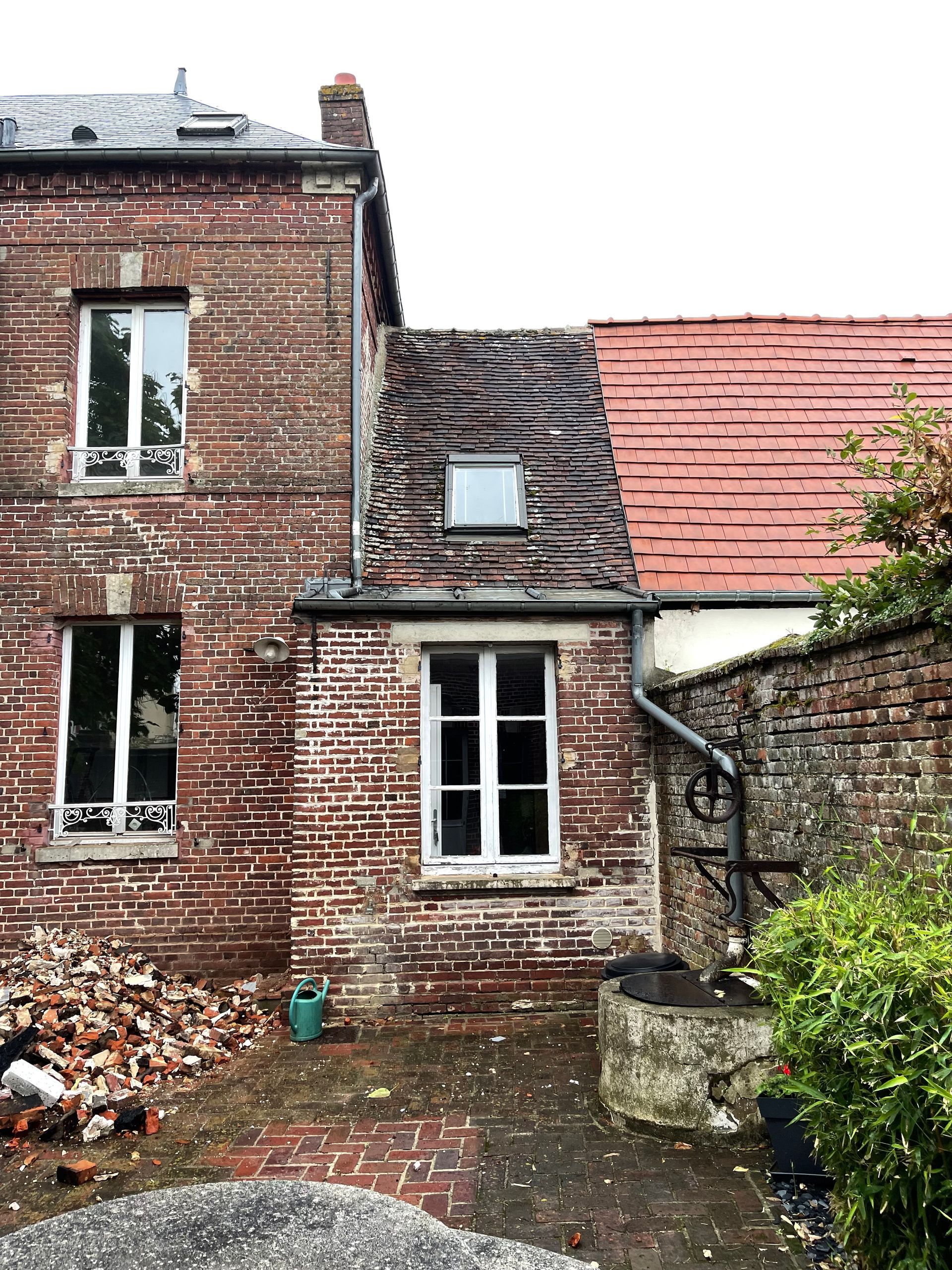 Toiture en tuiles plates à rénover