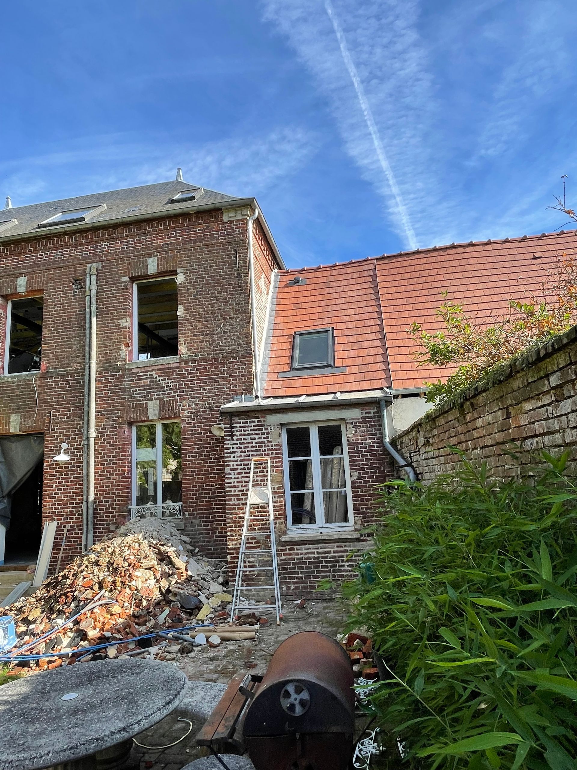 Toit en tuiles plates rénové