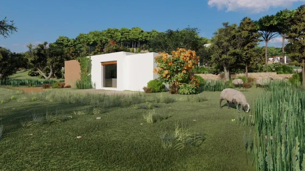 Una oveja está pastando en un campo frente a una casa.