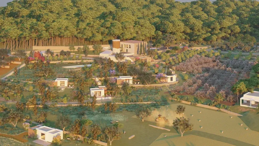 Una vista aérea de una zona residencial rodeada de árboles y casas.