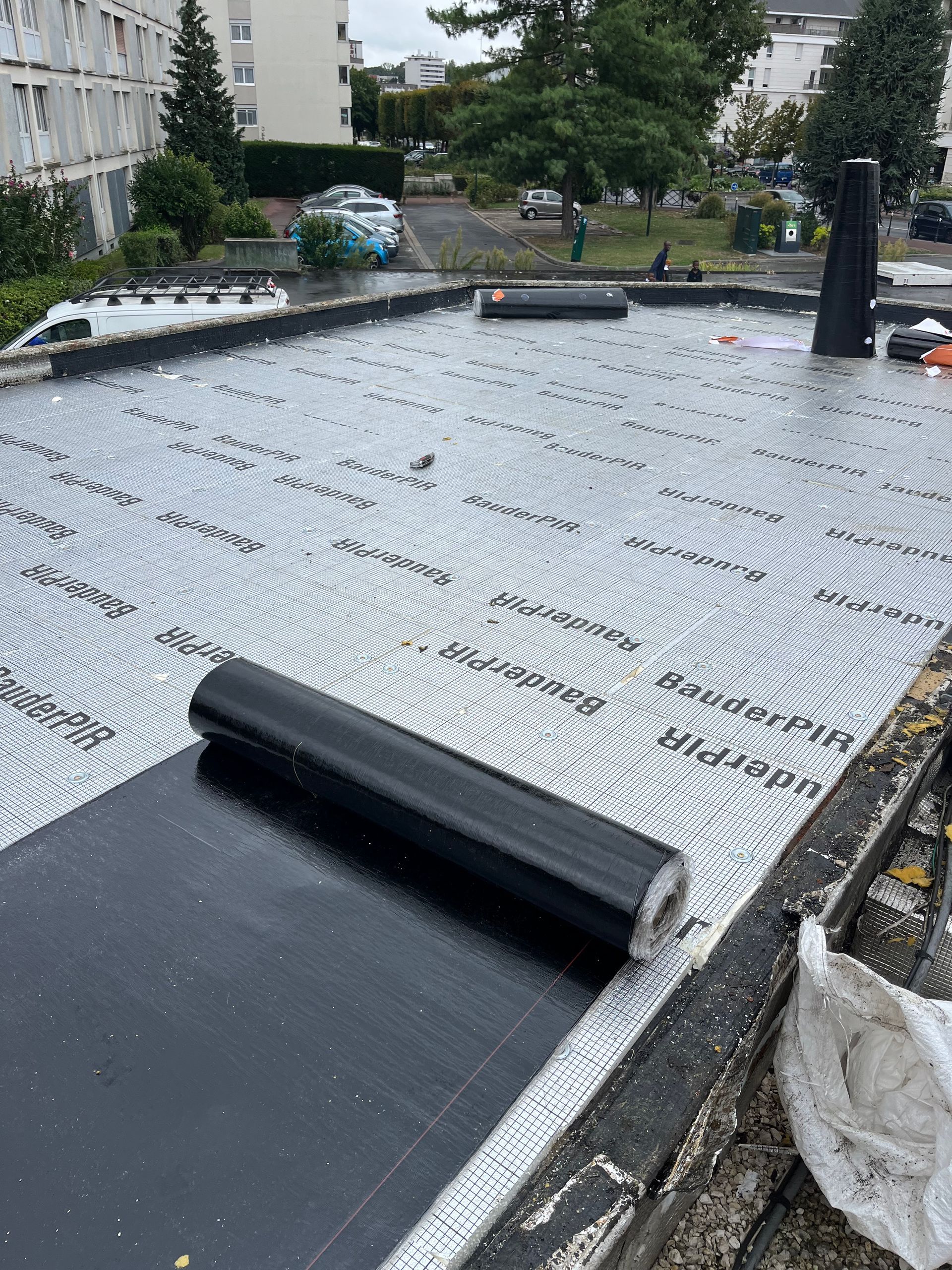 Installation de rouleaux d'étanchéité