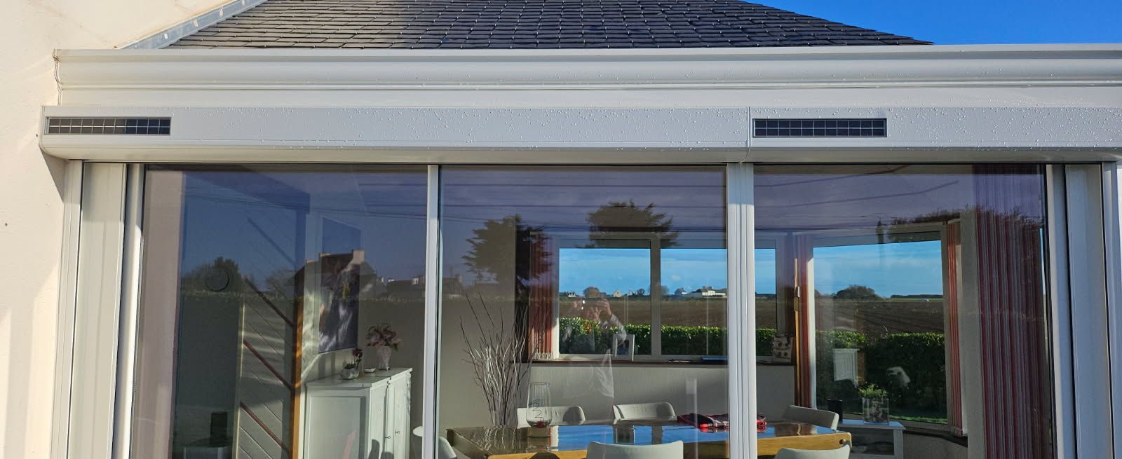 Grandes portes coulissantes en verre