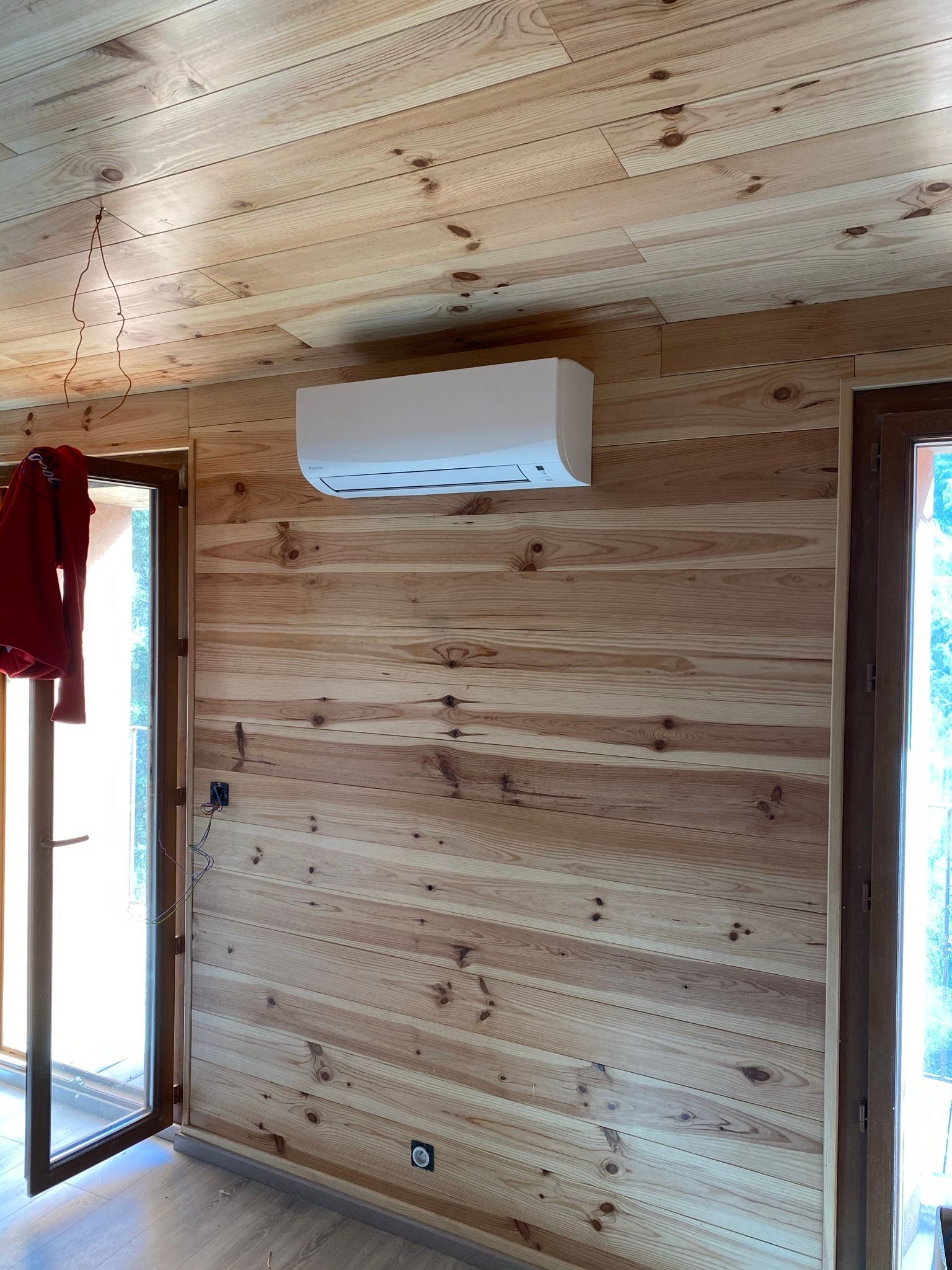 Climatisation dans une maisonnette en bois