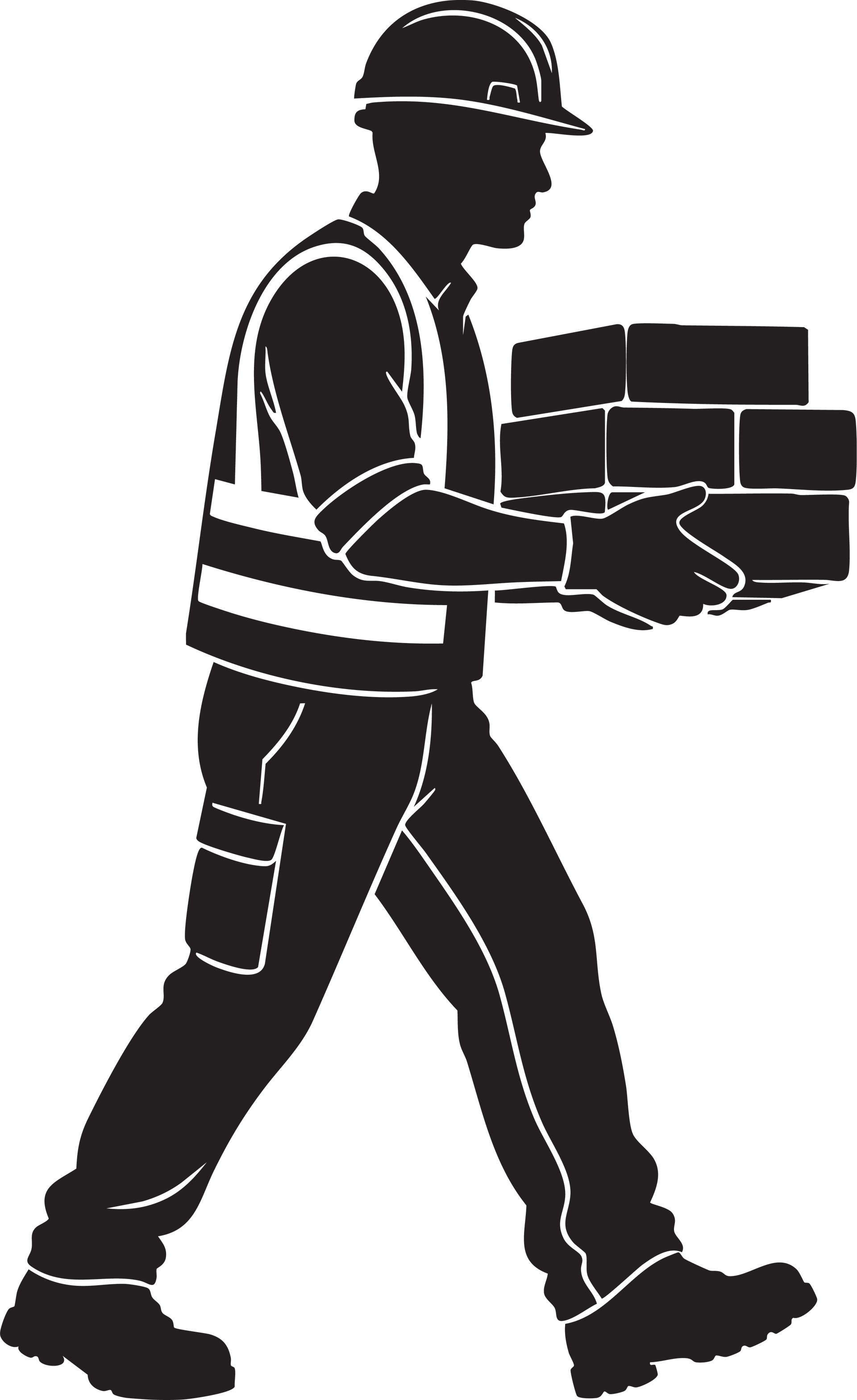 Ouvrier du bâtiment transportant des briques, marchant de profil, portant un casque et un gilet réfléchissant.