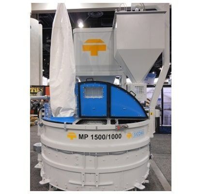Máquina industrial con carcasa azul y tolva blanca, etiquetada como MP 1500/1000, en un entorno de fábrica.