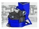 Máquina industrial azul con componentes negros frente a un fondo de plano técnico.