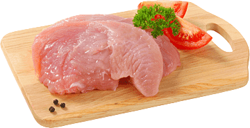 verse stukjes vlees op een houten bord