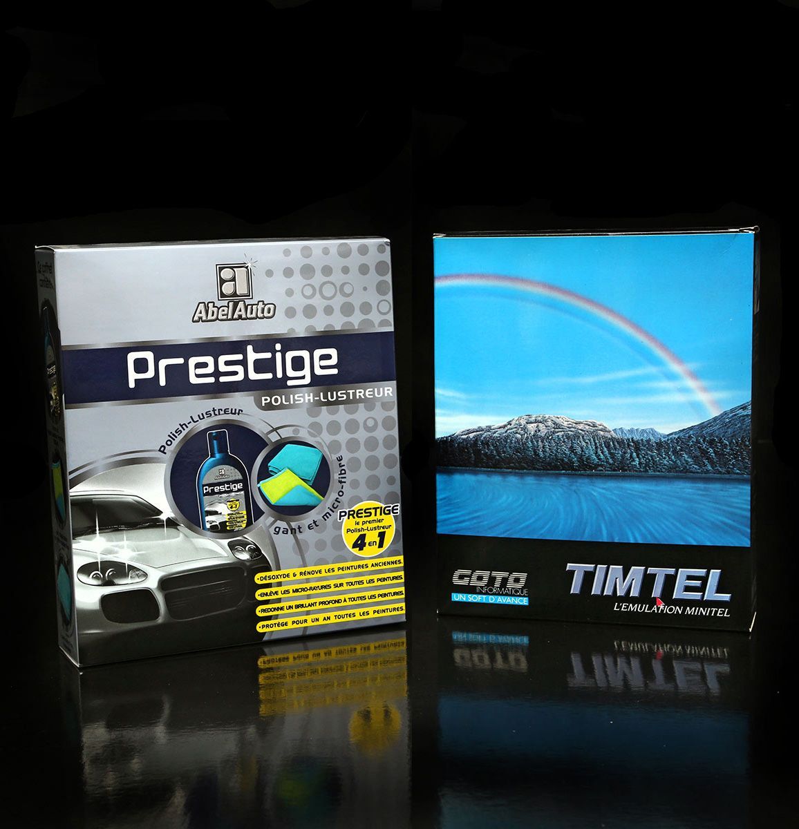 Deux emballages produits : « Prestige » avec une voiture et Timtel avec un arc-en-ciel au-dessus d'un lac.