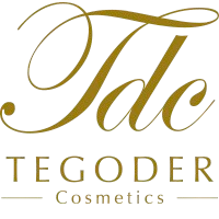 Logotipo dorado para TEGODER Cosmetics, con las iniciales 