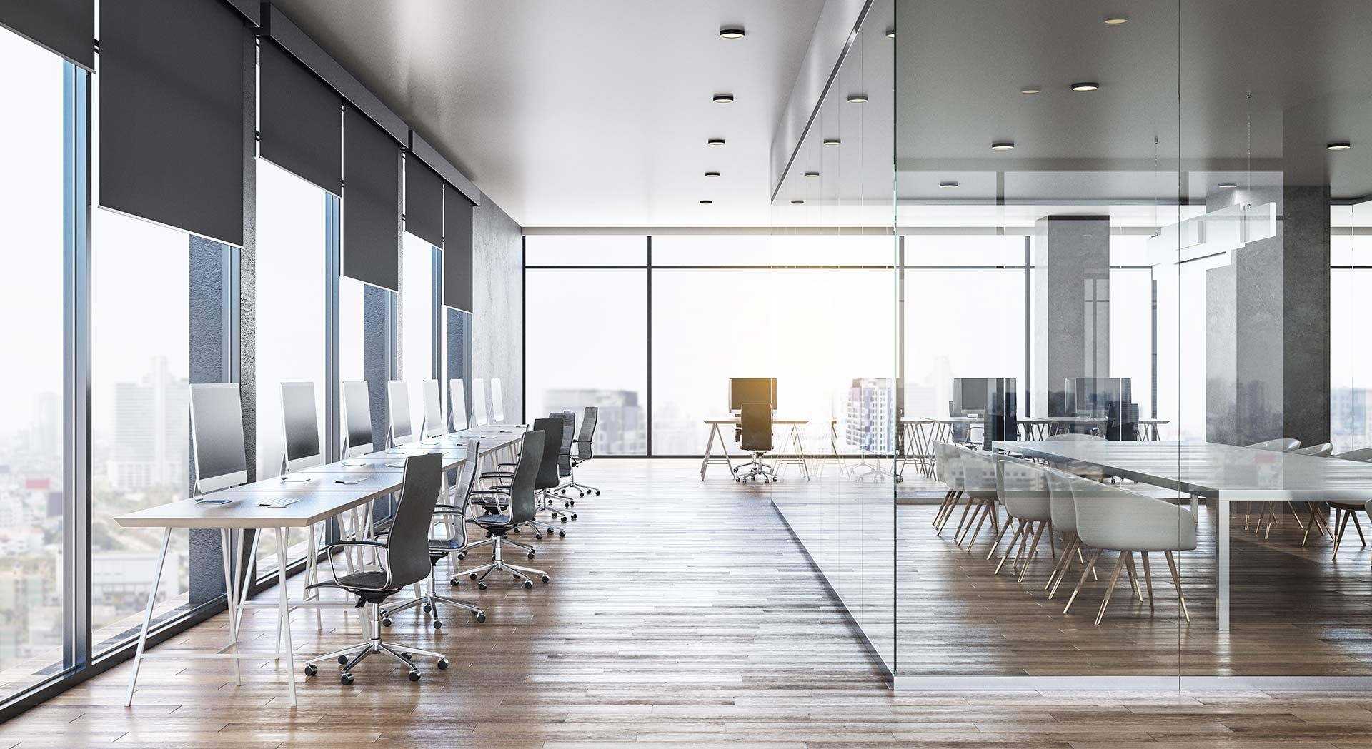 Bureaux en open space avec des cloisons vitrées