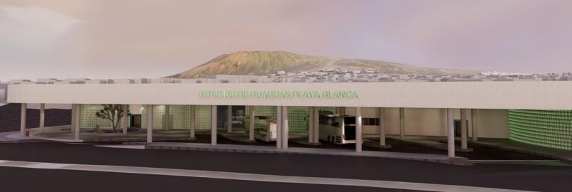 Un edificio con letras verdes que dicen 