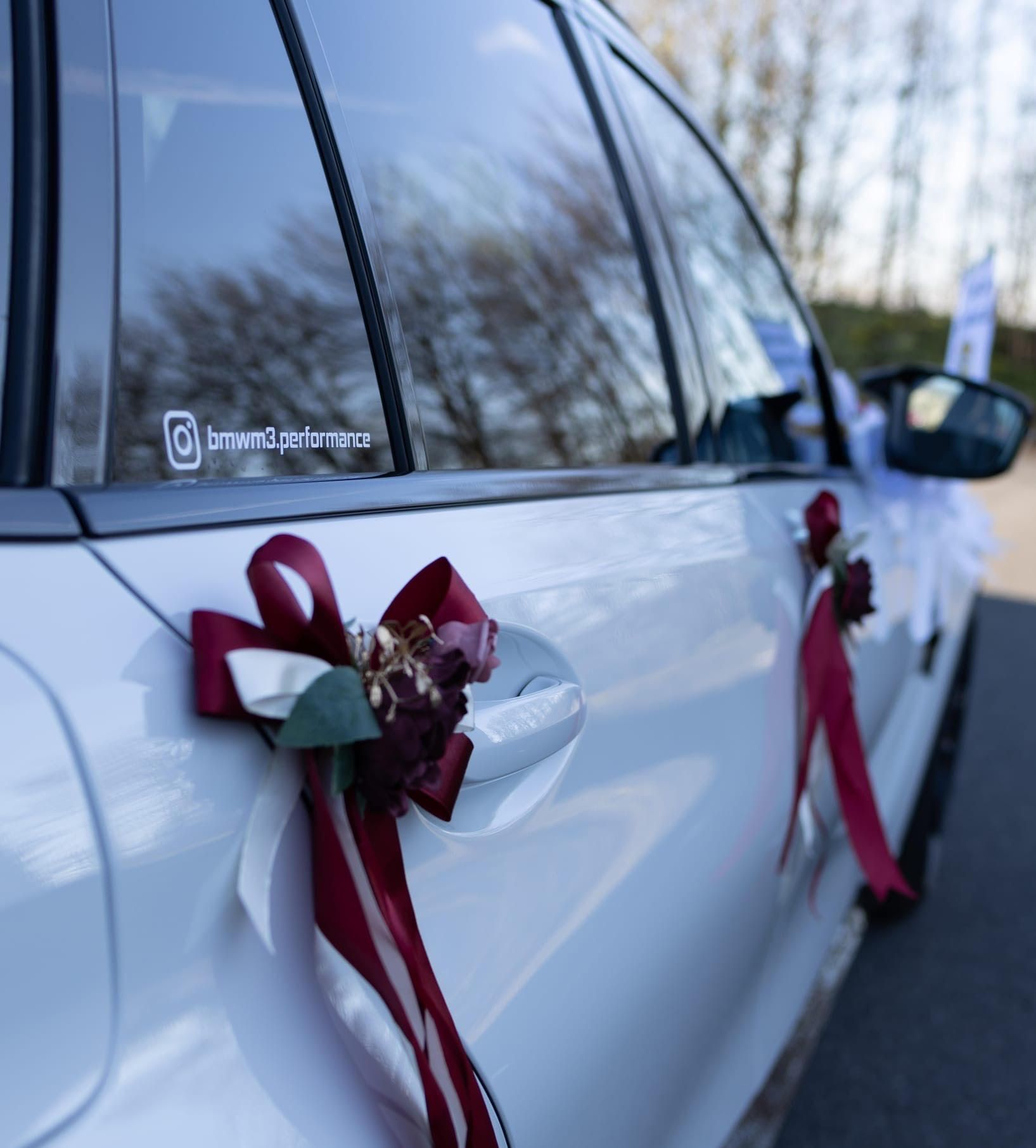 BMW M3 Touring Competition als Hochzeitsauto mit Schleifen