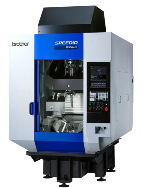 Máquina CNC Brother SPEEDIO, centro de fresado industrial blanco y azul con panel de control y cámara de trabajo abierta.