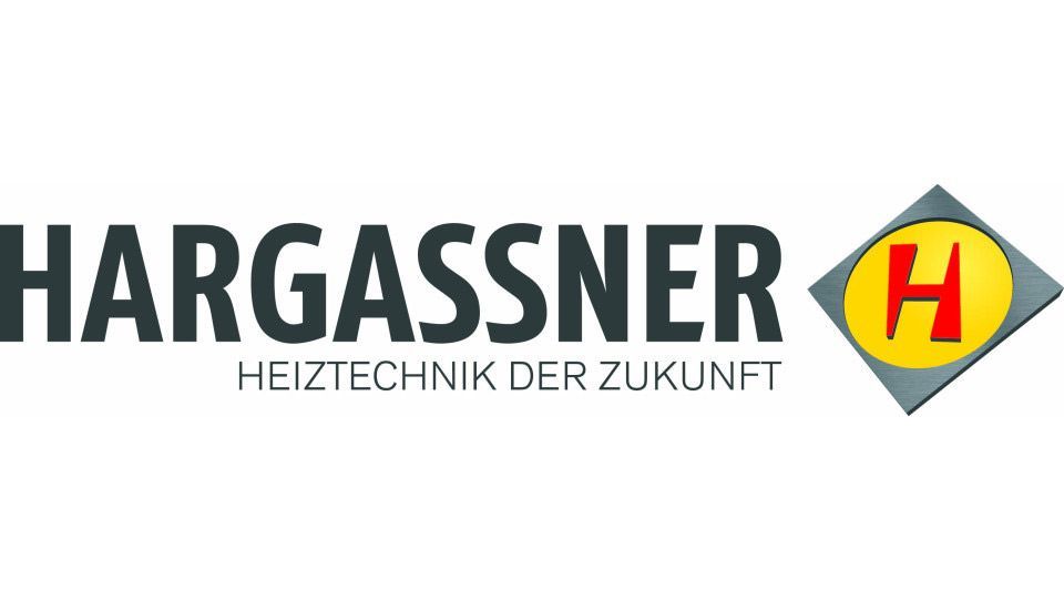 A logo for a company called hargassner heiztechnik der zukunft.