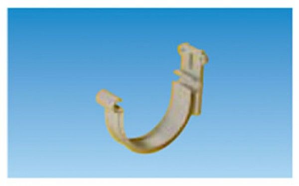 Un gancho de plástico blanco reposa sobre una superficie azul.