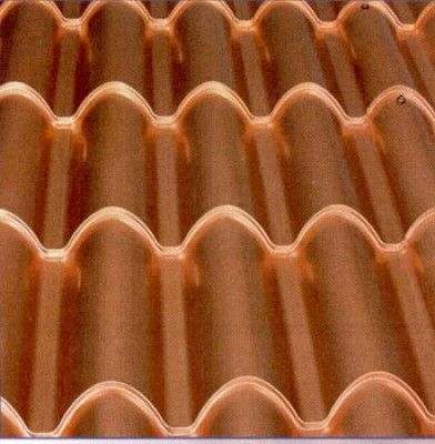 Un primer plano de un techo de tejas de cobre