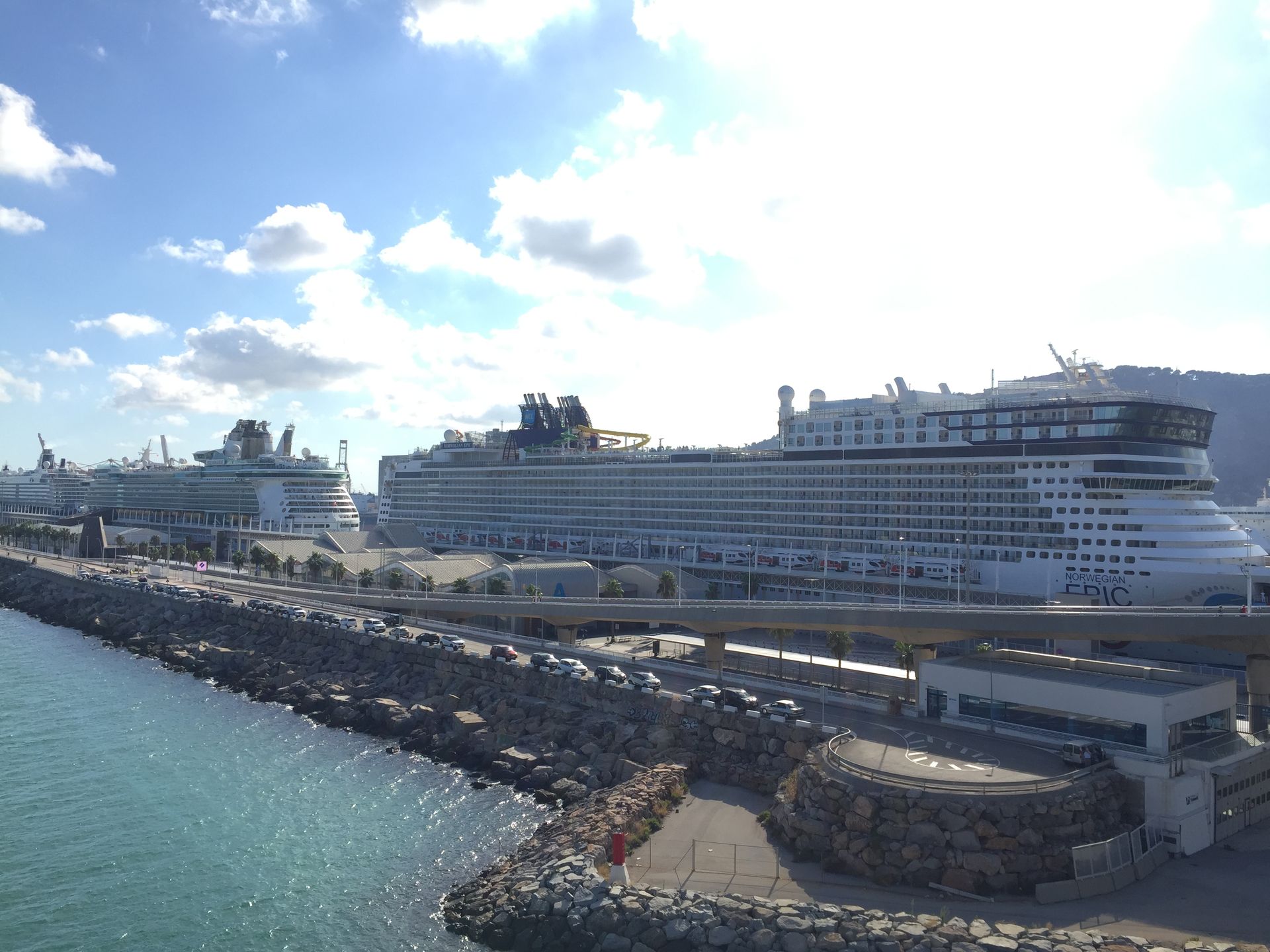 a large cruise ship is docked in Barcelona port