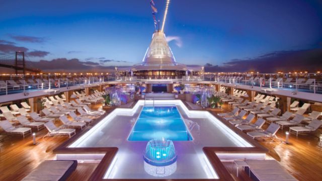 Pool Deck on Oceania Cruises Marina, there is a large swimming pool on the deck of a cruise ship .