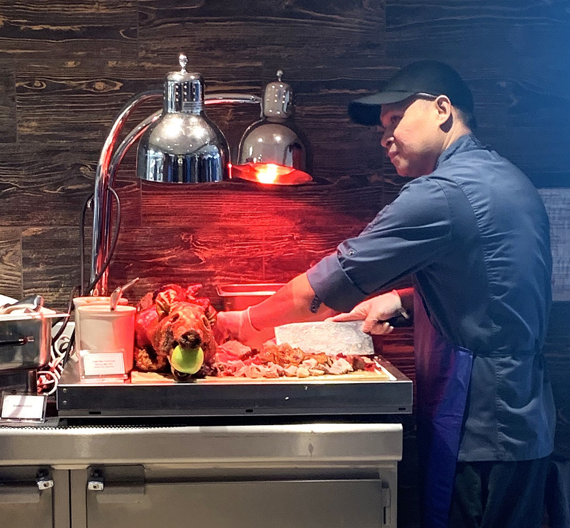 A man is preparing BBQ food